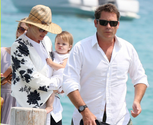 Uma with her husband and daughter