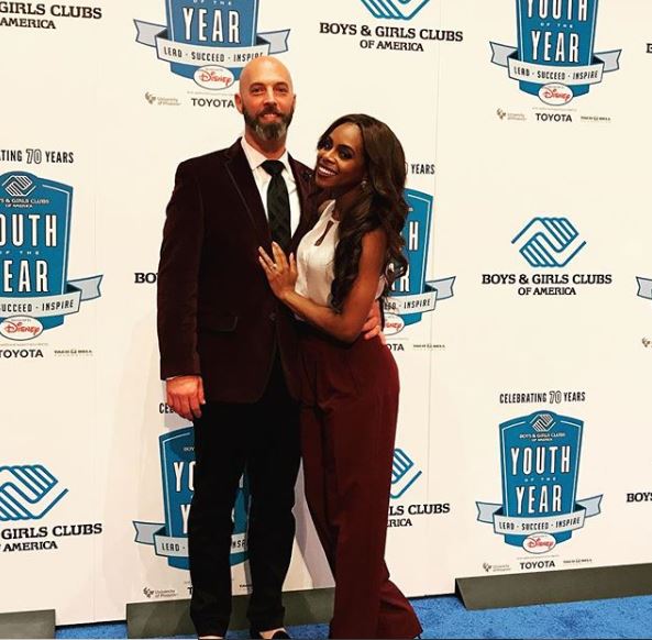 Chris Bassett with wife