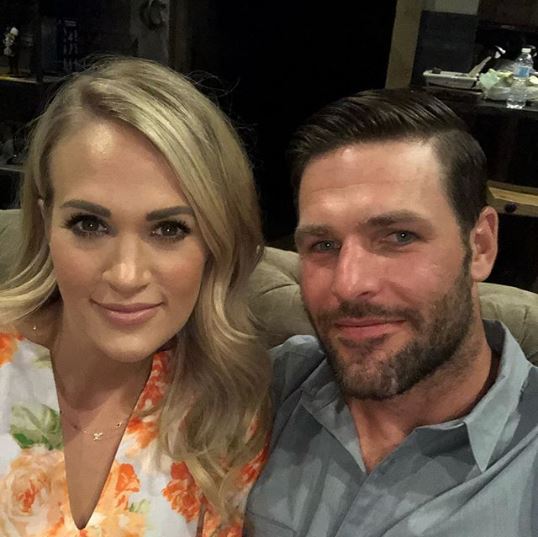 Mike Fisher with wife Carrie Underwood
