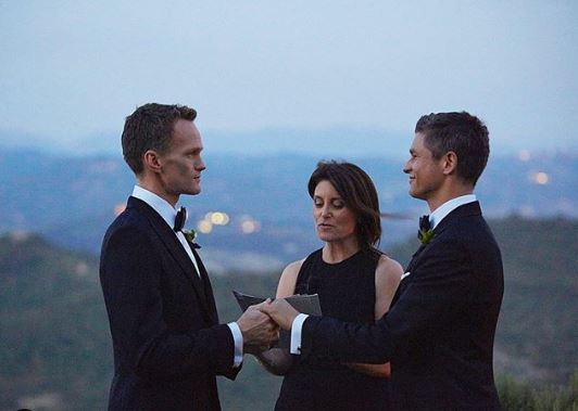 Neil Patrick Harris and David Burtka taking wedding vows.