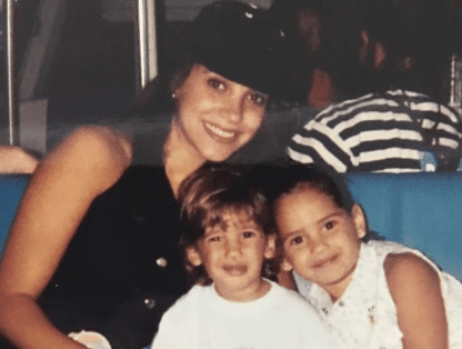 A childhood photo of Adria Arjona with her mother Leslie Torres and one of her brothers.