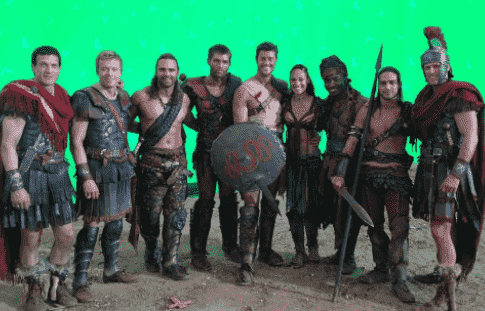 A picture of Spartacus cast including Cynthia Addai-Robinson in their costume.