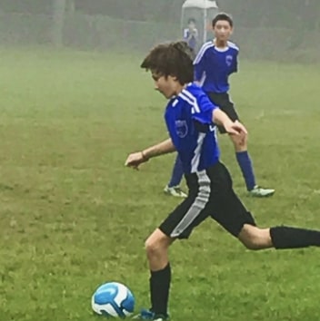 Skylar Gaertner playing football