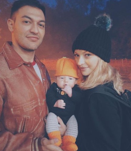 Francesca Eastwood with her boyfriend and her son Titan