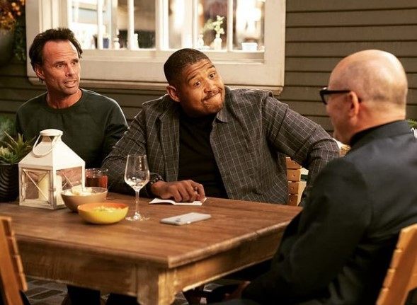 Omar Benson Miller with his co-stars form 