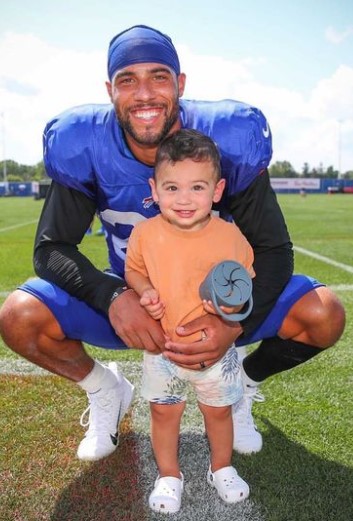 micah-hyde-on-the-game-field-with-his-son Micah Hyde on the game field with his son
