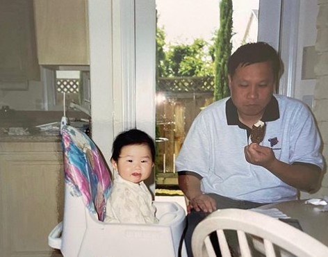 Young Jaime Xie with her father  
