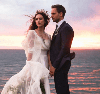 Troian Bellisario with her husband Patrick J. Adams