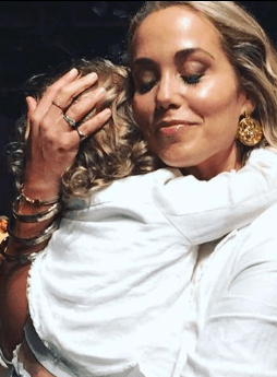 Elizabeth Berkley with her son