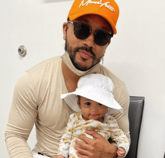 Romeo Miller with his daughter