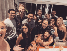 Alex Tarrant with the cast of NCIS   