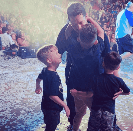 Sal Vulcano with nephews on the stage after a show.