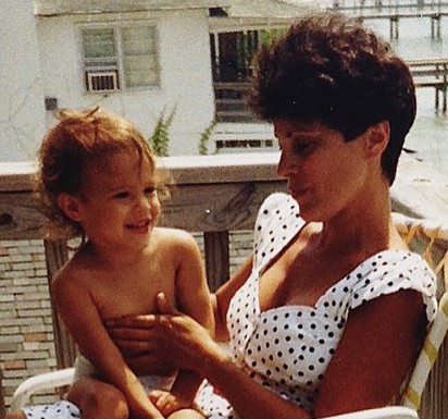 Childhood image of Charly Arnolt with her mother