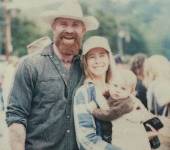 Devan Chandler with his wife, Jesse Golden and child