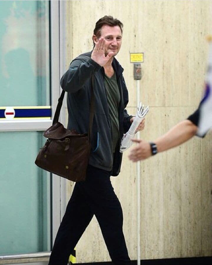 Liam Neeson stands tall with an imposing 6 feet 4 inches .