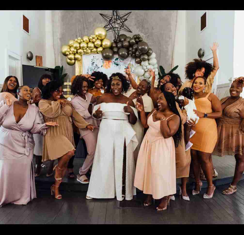 Danielle Brooks poses with a group of women in a celebratory photo.