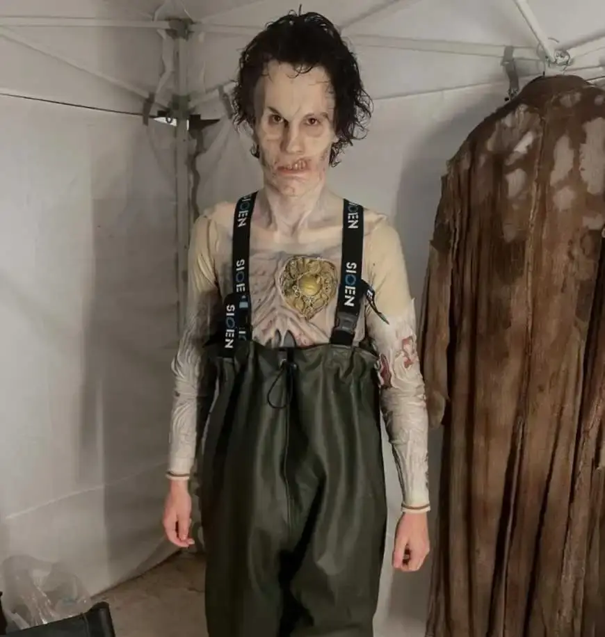 Isaac (Slurp), a character from the TV series, Wednesday where he has gaunt skin and black hair, and he