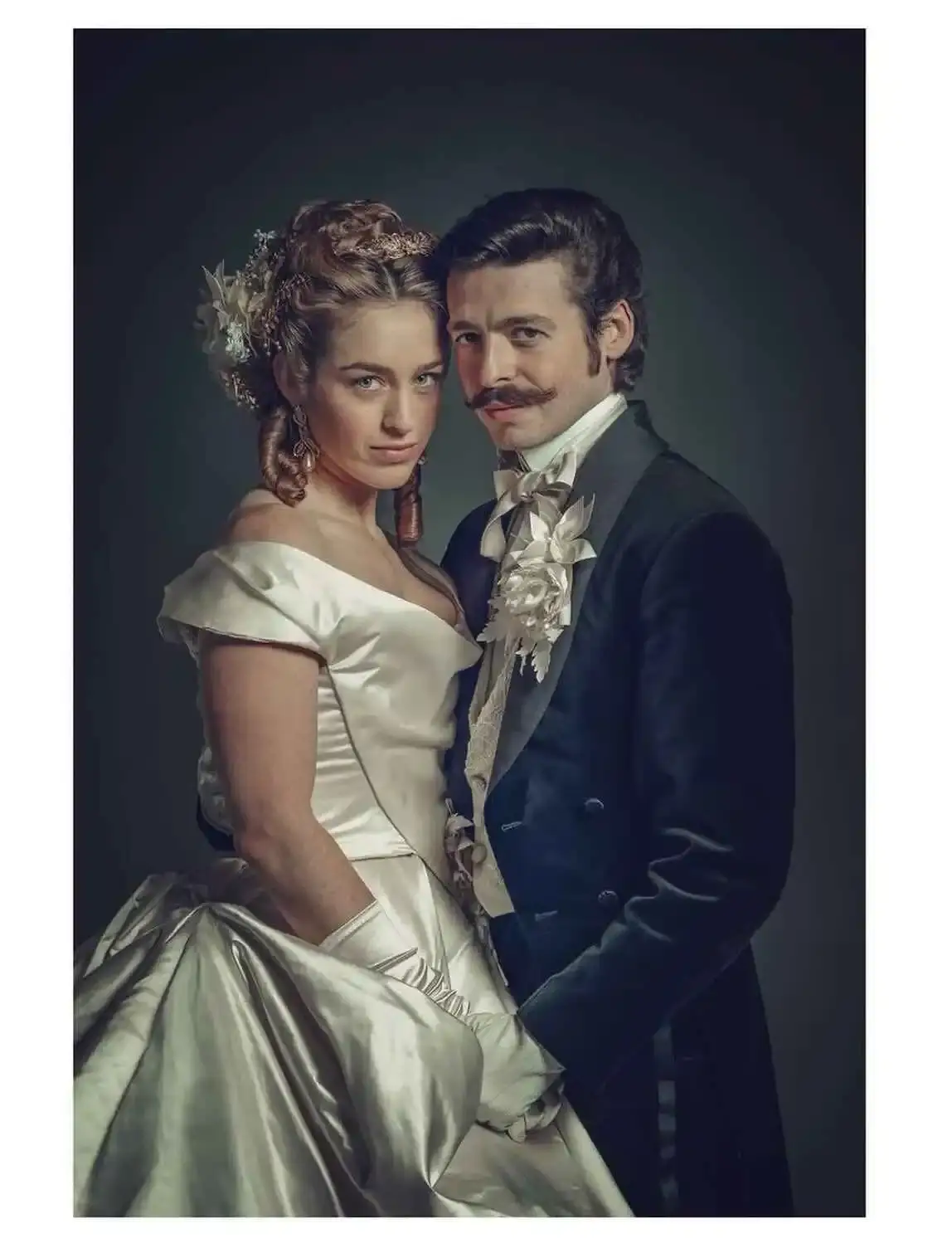 Anthony Boyle and  Danielle Galligan in a black tailcoat and white off-the-shoulder gown respectively, in period costume for the series Say Nothing.