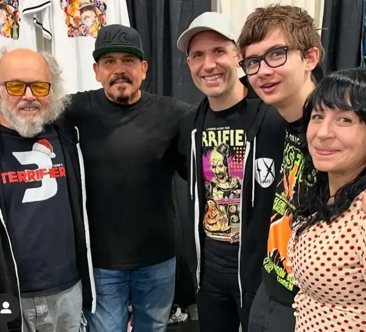Clint Howard, wearing a black 