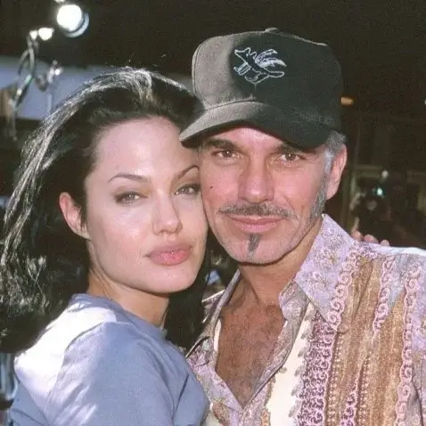 Billy Bob Thornton and his ex wife Angelina Jolie embrace, with Jolie