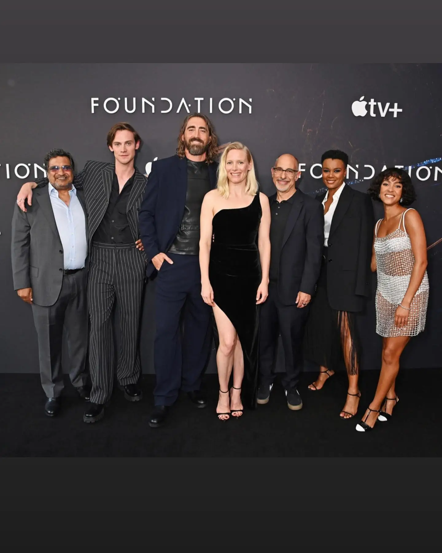 Seven cast and crew members of Foundation Season 2 for a group photo.