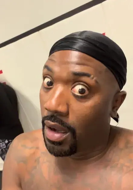 A close-up selfie video screenshot shows Ray J wearing a black durag with his eyes wide open in a dramatic, wide-eyed expression of shock.