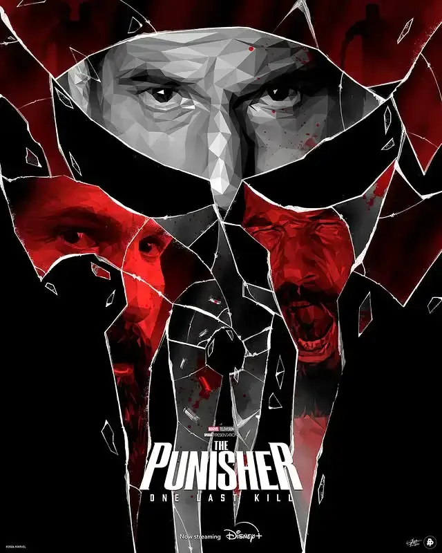 A shattered glass poster for The Punisher displaying Frank Castle