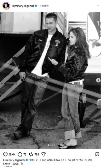 A black-and-white photo of Brad Pitt and Angelina Jolie chatting outside a trailer on the set of Mr. & Mrs. Smith.