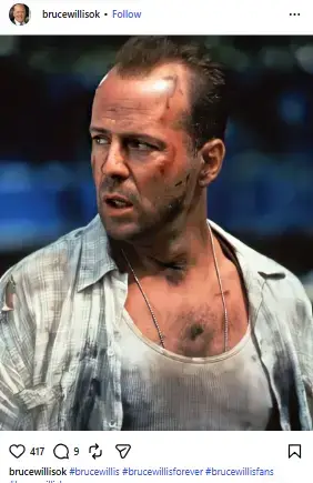 Bruce Willis looking tense and bruised as John McClane in a grimy undershirt and open button-down shirt.