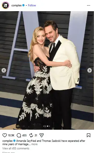 Amanda Seyfried in an embroidered black-and-white gown embracing Thomas Sadoski in a white tuxedo jacket on the red carpet.