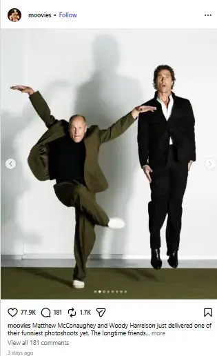 Woody Harrelson balances playfully on one foot while Matthew McConaughey jumps straight up in the air during a studio photoshoot.