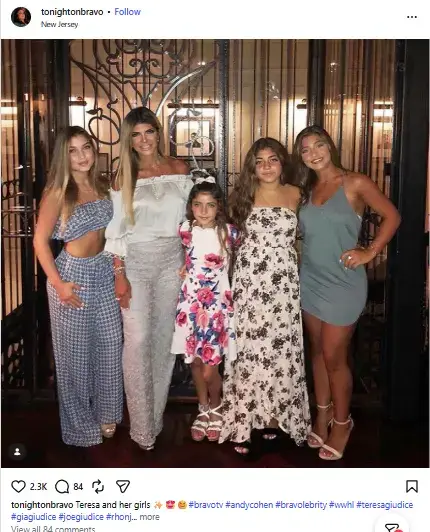 Teresa Giudice posing together indoors in stylish evening outfits with her four daughters Gia, Gabriella, Milania, and Audriana.