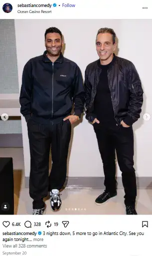 Joe La Puma in a dark track jacket standing beside comedian Sebastian Maniscalco in a black bomber jacket and trousers.