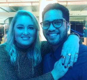 Alex Tarrant With his wife, Luci Hare where she is hugging him and both of them are smiling at the c