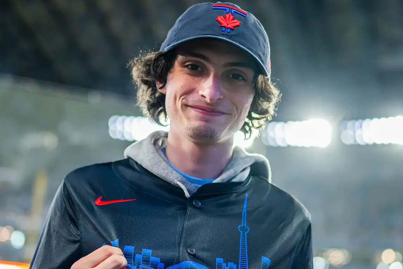 Finn Wolfhard wearing a cap