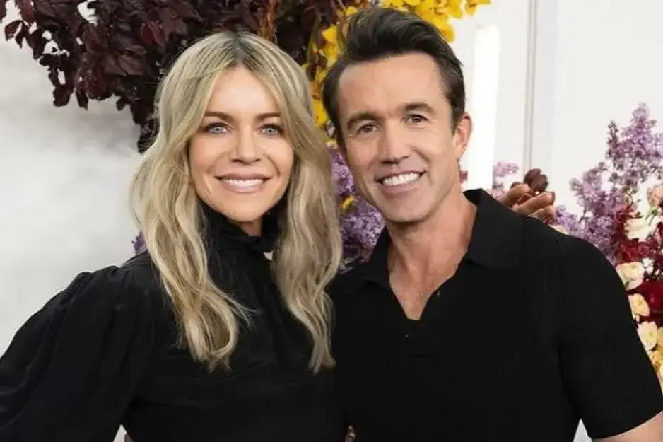 Rob McElhenney And Kaitlin Olson smiling.