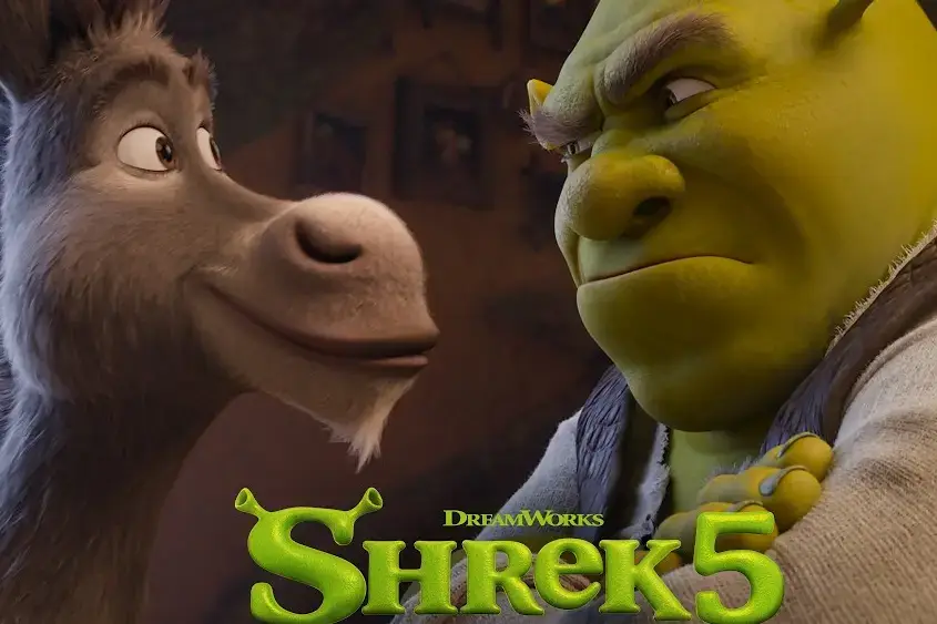 Donkey smiling next to Shrek looking at him.️