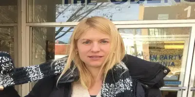 Claire Danes wearing a black puffer coat