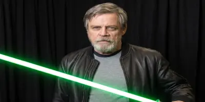 Mark Hamill with lightsaber.